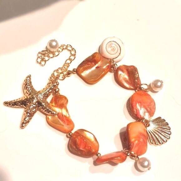 New ANTHRO Orange & Gold Starfish Seashell Bracelet - Picture 1 of 8